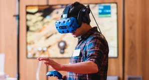 A person with virtual reality glasses.