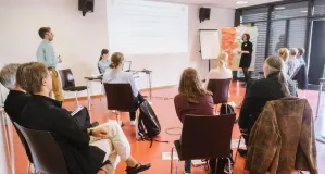 Workshop situation with several participants (one moderator, one presenter, and several listeners).
